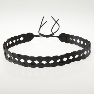 Detail of black woven faux leather choker with diamond cut-outs and lace-up back
