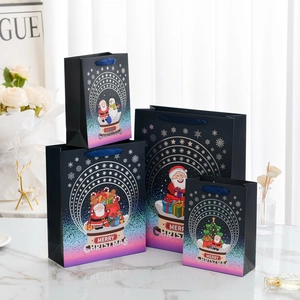 Elegant Christmas gift bags in four sizes with gold foil stamping and festive designs