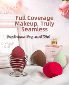 Detail of multi-colored makeup sponges with a metal stand for wet and dry use