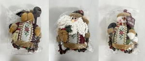 Close-up of plush Christmas ornaments set featuring Santa, Snowman and Reindeer