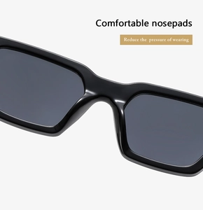 Close-up of comfortable nose pads on black square sunglasses to reduce wearing pressure