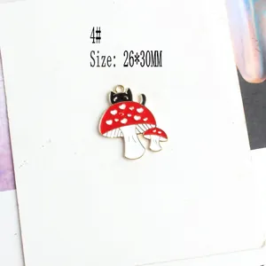 Detail of DIY alloy charm featuring a black cat on a mushroom, size 26x30mm for jewelry