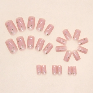 Pink eggshell fragment press-on nails with purple and green artistic foil accents