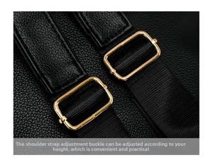 Detail shot of black pebbled leather backpack with adjustable gold metal buckle