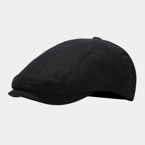 Classic black linen newsboy cap with breathable textured fabric for men and women
