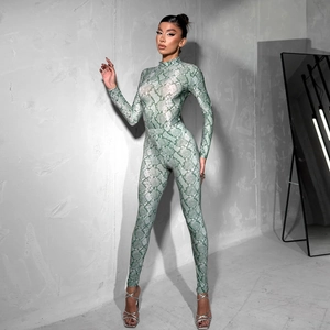 Tuta aderente da donna con stampa serpente verde, maniche lunghe e tessuto elasticizzato