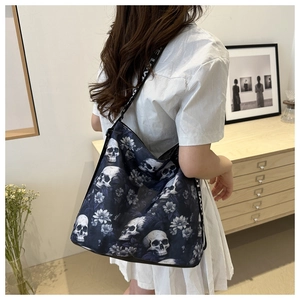 Gothic style nylon tote bag with skull and flower print and LOVE lettered strap