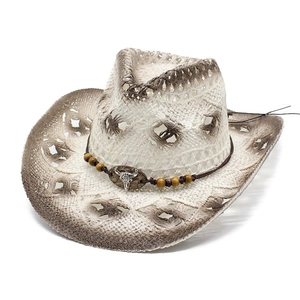 Ethnic western cowboy straw hat with bull skull metal ornament and wooden beads