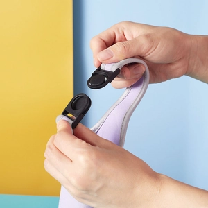 Detail of purple strap with black plastic buckle for 750ml neoprene bottle sleeve
