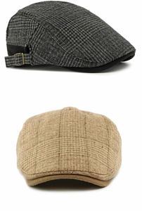 Detailed view of grey and brown plaid wool newsboy caps with adjustable metal buckles