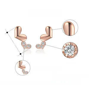 Detail view of 925 silver heart stud earrings with rose gold plating and AAAA cubic zirconia