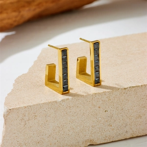 Golden J-shaped stainless steel earrings with black square zircon on stone