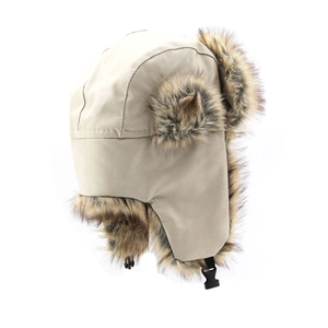 Detail of beige faux leather aviator hat with brown fur trim and adjustable buckle