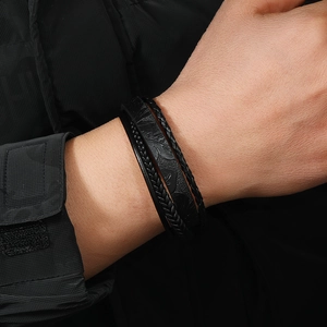 Men's multi-layer black braided leather bracelet with alloy buckle on male wrist