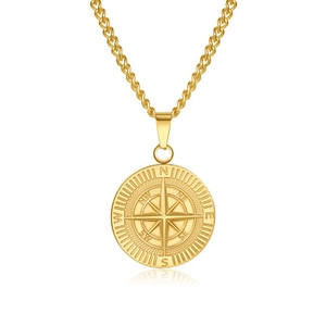 Vue détaillée du pendentif boussole doré de Saint-Michel avec des repères de direction gravés