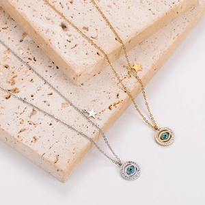 Vintage stainless steel evil eye star necklaces in gold and silver with blue stones