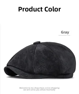 Detailed close-up of charcoal gray newsboy hat showing retro suede texture and panels