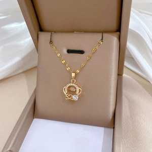Elegant gold titanium steel necklace with 520 sparkling zircon pendant in jewelry box