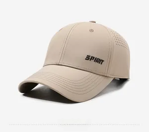 Detail of laser-perforated breathable mesh and SPIRIT logo on beige baseball cap