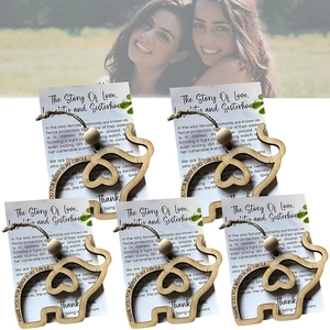 Detail of wooden elephant charm with engraved quote and friendship story card set