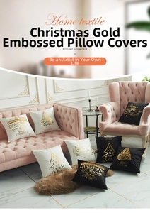 Detail of velvet Christmas pillow covers with gold foil tree motifs on a pink sofa