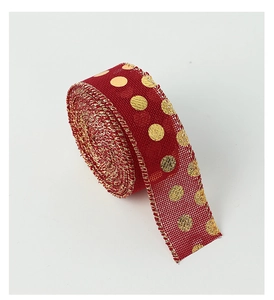 Dettaglio del nastro in finto lino rosso con pois dorati glitterati per confezioni regalo