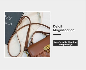 Detail magnification of brown quilted crossbody bag with adjustable strap and gold buckle