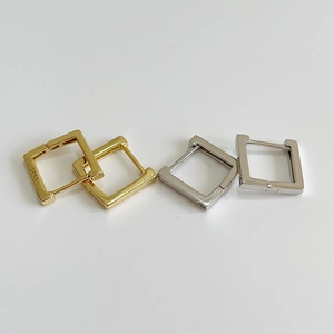 Square S925 sterling silver hoop earrings set in gold and silver finishes on white background