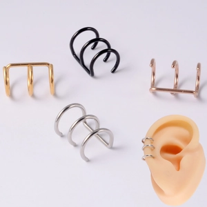 Detailed set of multi-layer ear cuffs in gold black silver and rose gold finishes