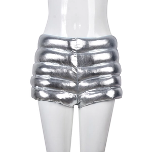 Silver quilted thermal shorts with metallic finish and high-waist futuristic design