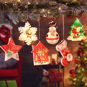 Festive Christmas LED hanging lights in star and tree shapes on snowy pine branches