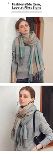 Detail of plaid tassel scarf in beige and green featuring soft cashmere-like texture