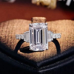 Elegant emerald-cut square zircon engagement ring with silver finish and side stones