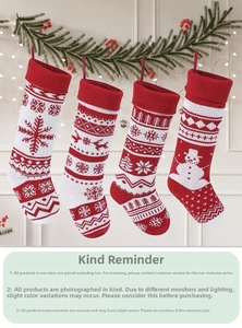 Detail showing red and white knit Christmas stockings with reindeer and snowflake patterns