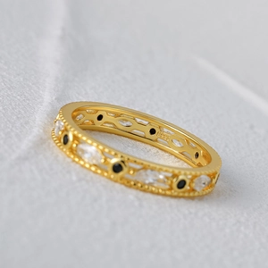 Detail of S925 silver ring featuring vintage beads with black and white zircon stones