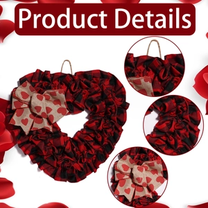 Detail view of heart wreath showing buffalo plaid fabric texture and burlap bow accents