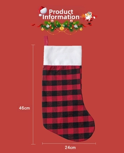 Detail view of a 46cm red and black buffalo plaid Christmas stocking with white faux fur trim