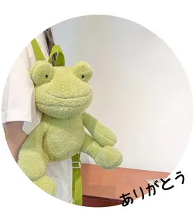 Side view of cute green plush frog backpack with soft texture and adjustable straps