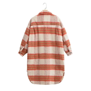 Detail of orange plaid wool coat showing thick fabric texture and back mid-length cut