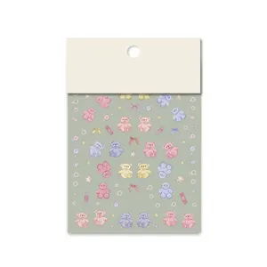 5D embossed nail art stickers featuring macaron bears, bows, and colorful polka dots