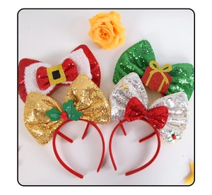 Detail view of four Christmas sequin bow headbands with festive holiday decorations