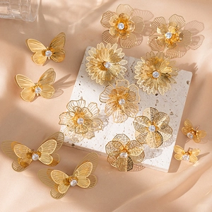Elegant gold hollowed flower and butterfly earrings with sparkling cubic zirconia accents