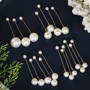Handmade bridal hair clips with white pearls and gold wire weave for wedding hairstyles