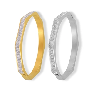 Octagonal titanium steel bangle in gold and silver finish with sparkling zircons