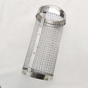 Close-up of a stainless steel cylindrical grill basket with fine mesh for outdoor BBQ