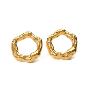 Detail of 18K gold plated irregular lava earrings with hollowed wavy texture