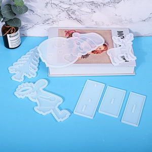 DIY Christmas resin molds set featuring Santa Claus, reindeer, and tree shapes for crafts