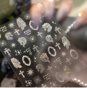 Macro shot of M-1367 holographic nail stickers featuring white horse and baroque patterns