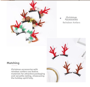 Detail of Christmas reindeer antler hair clips with pine cones and festive decorations