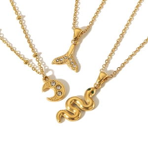 Gold stainless steel necklace set with moon, fish tail and snake pendants with rhinestones